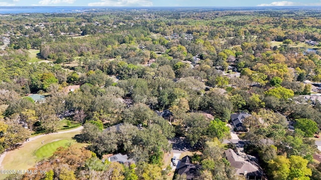 birds eye view of property with a forest view
