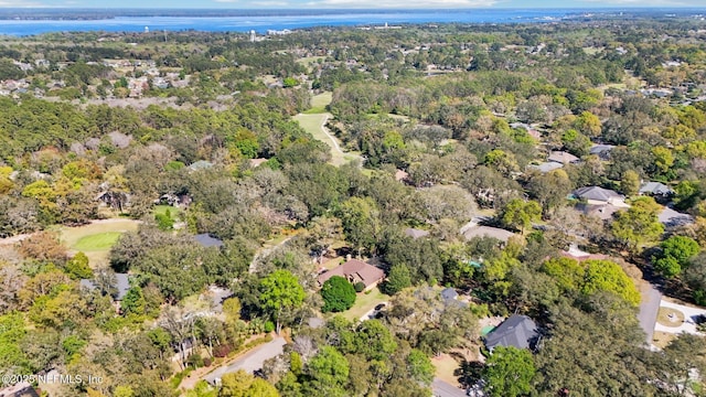 drone / aerial view with a view of trees