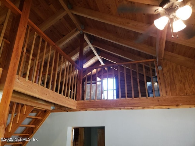 interior details featuring a ceiling fan and wood ceiling