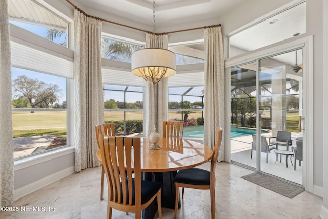 1193 Queens Harbor Blvd, Jacksonville, FL 32225 - dining area with marble finish floor, baseboards, and a high ceiling