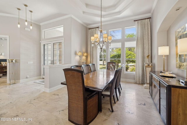 1193 Queens Harbor Blvd, Jacksonville, FL 32225 - dining space featuring an inviting chandelier, a raised ceiling, ornamental molding, and baseboards