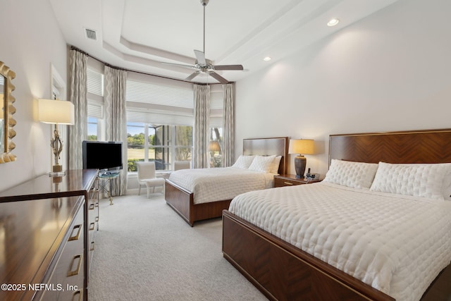 1193 Queens Harbor Blvd, Jacksonville, FL 32225 - bedroom with visible vents, recessed lighting, a ceiling fan, light carpet, and a tray ceiling