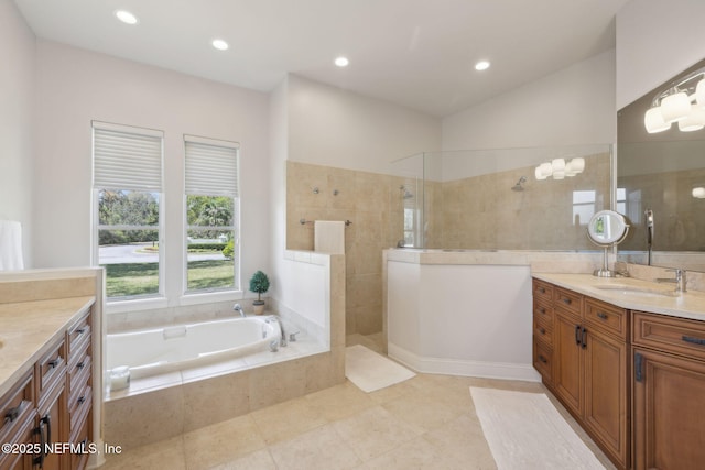 1193 Queens Harbor Blvd, Jacksonville, FL 32225 - full bath featuring tile patterned flooring, vanity, recessed lighting, a garden tub, and a walk in shower