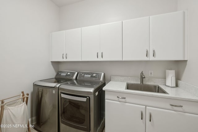 1193 Queens Harbor Blvd, Jacksonville, FL 32225 - washroom featuring separate washer and dryer, cabinet space, and a sink