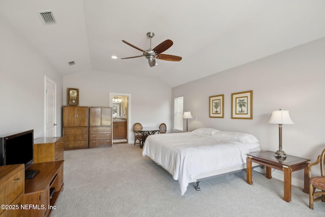 1193 Queens Harbor Blvd, Jacksonville, FL 32225 - bedroom with vaulted ceiling, light colored carpet, connected bathroom, visible vents, and a ceiling fan