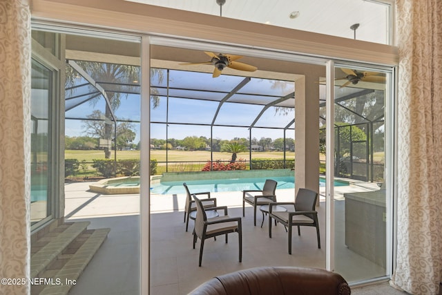 1193 Queens Harbor Blvd, Jacksonville, FL 32225 - view of pool with glass enclosure, a pool with connected hot tub, a patio area, and a ceiling fan