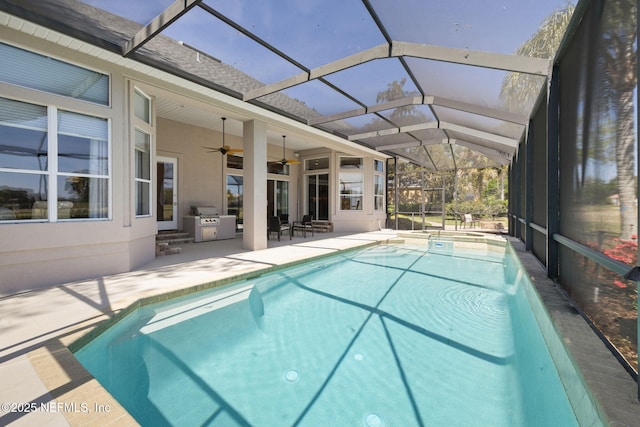 1193 Queens Harbor Blvd, Jacksonville, FL 32225 - view of swimming pool with ceiling fan, a lanai, a pool with connected hot tub, and a patio area