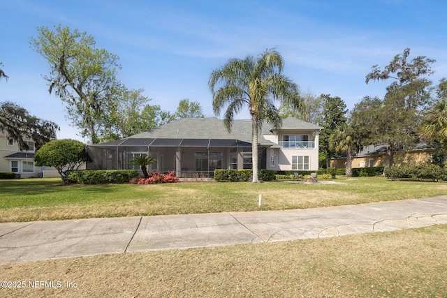 1193 Queens Harbor Blvd, Jacksonville, FL 32225 - view of front facade featuring a front yard, a lanai, and stucco siding
