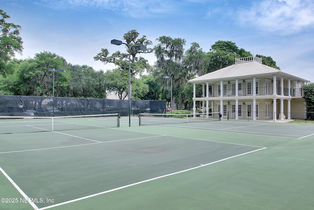 1193 Queens Harbor Blvd, Jacksonville, FL 32225 - view of tennis court with community basketball court and fence