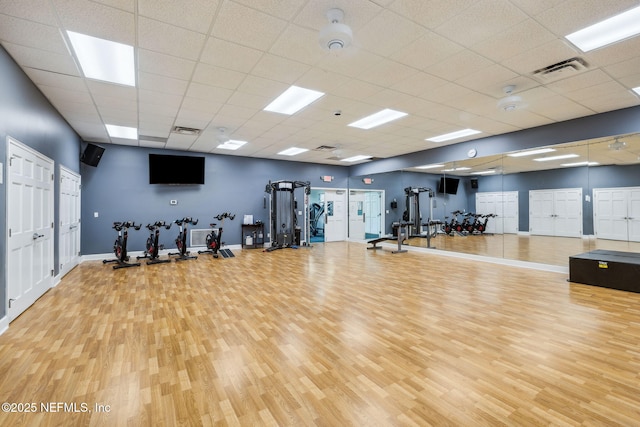 1193 Queens Harbor Blvd, Jacksonville, FL 32225 - gym featuring baseboards, visible vents, wood finished floors, and a paneled ceiling