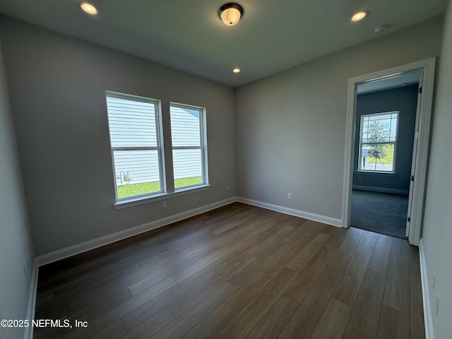 294 Lamego Ln, Saint Augustine, FL 32095 - spare room featuring dark wood finished floors and recessed lighting