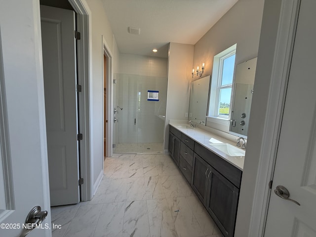 294 Lamego Ln, Saint Augustine, FL 32095 - bathroom featuring marble finish flooring, a stall shower, and double vanity