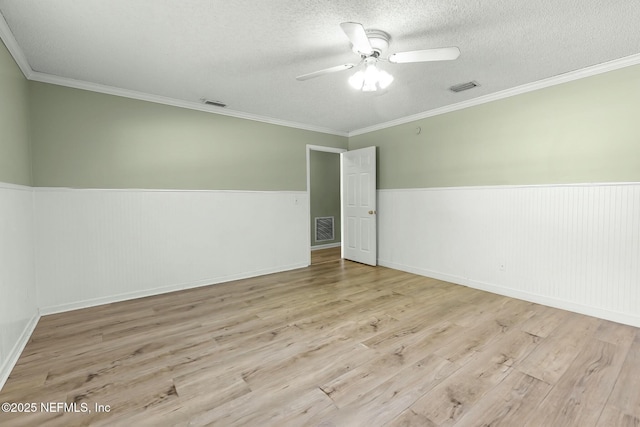 7552 Pottsburg Landing Dr, Jacksonville, FL 32216 - unfurnished room with wainscoting and visible vents