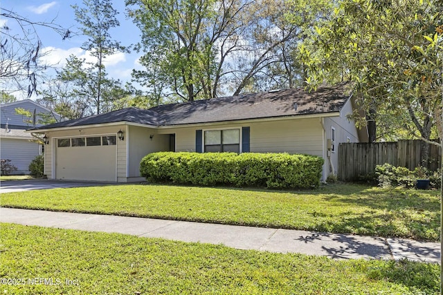 7552 Pottsburg Landing Dr, Jacksonville, FL 32216 - single story home with a front yard, concrete driveway, a garage, and fence