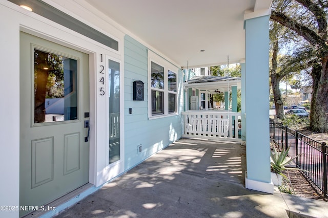 view of patio featuring a porch