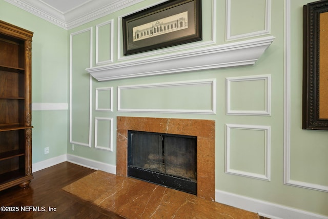 6260 Highlands Ct, Ponte Vedra Beach, FL 32082 - detailed view of crown molding, a fireplace with flush hearth, wood finished floors, and baseboards