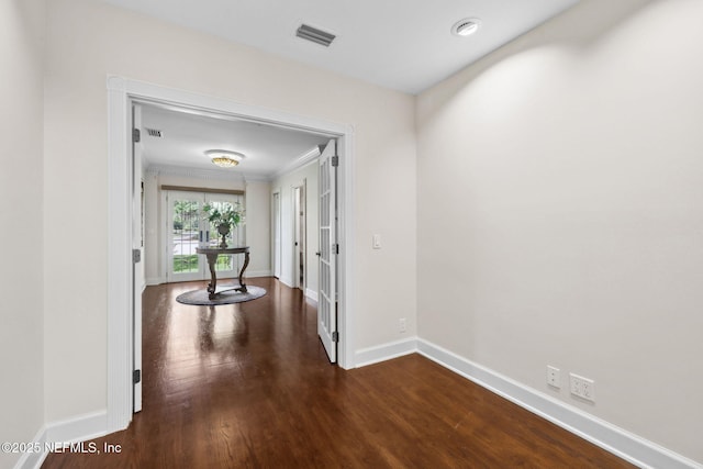 6260 Highlands Ct, Ponte Vedra Beach, FL 32082 - hallway featuring crown molding, baseboards, and dark wood-style flooring