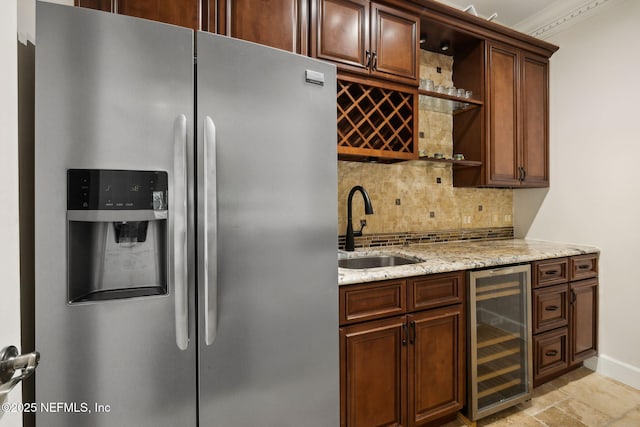 6260 Highlands Ct, Ponte Vedra Beach, FL 32082 - indoor bar featuring stainless steel fridge with ice dispenser, wine cooler, backsplash, baseboards, and crown molding