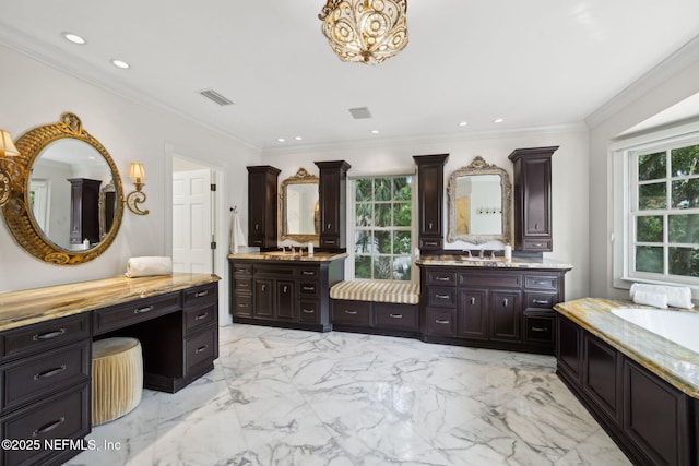 6260 Highlands Ct, Ponte Vedra Beach, FL 32082 - bathroom featuring plenty of natural light, recessed lighting, two vanities, marble finish flooring, and crown molding