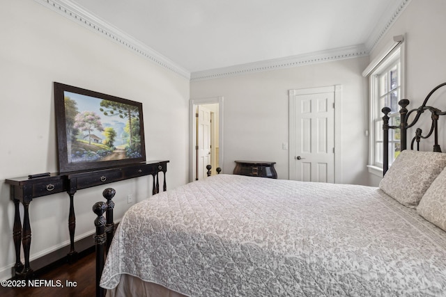 6260 Highlands Ct, Ponte Vedra Beach, FL 32082 - bedroom featuring crown molding, dark wood-style flooring, and baseboards