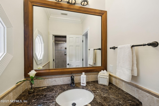6260 Highlands Ct, Ponte Vedra Beach, FL 32082 - bathroom featuring ornamental molding, vanity, and tiled shower