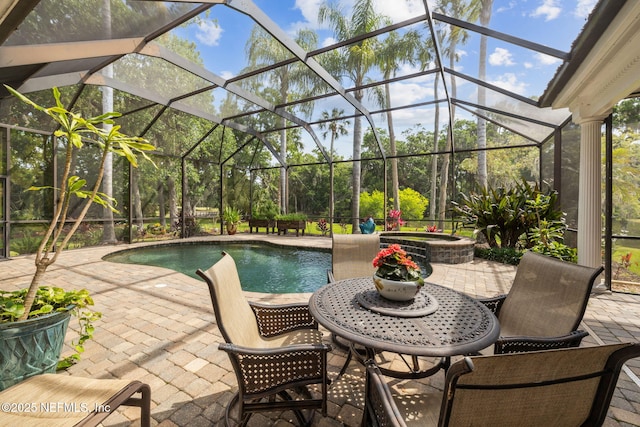 6260 Highlands Ct, Ponte Vedra Beach, FL 32082 - view of pool featuring a patio, outdoor dining area, glass enclosure, and a pool with connected hot tub