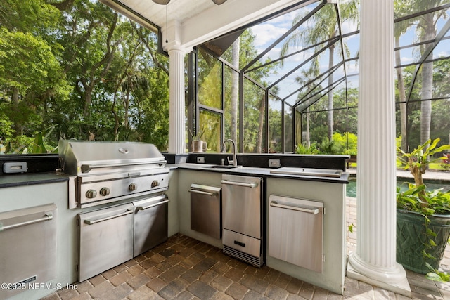 6260 Highlands Ct, Ponte Vedra Beach, FL 32082 - view of patio / terrace featuring a grill, a sink, an outdoor kitchen, a ceiling fan, and glass enclosure
