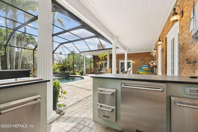 6260 Highlands Ct, Ponte Vedra Beach, FL 32082 - view of patio / terrace featuring exterior kitchen, a lanai, and an outdoor pool