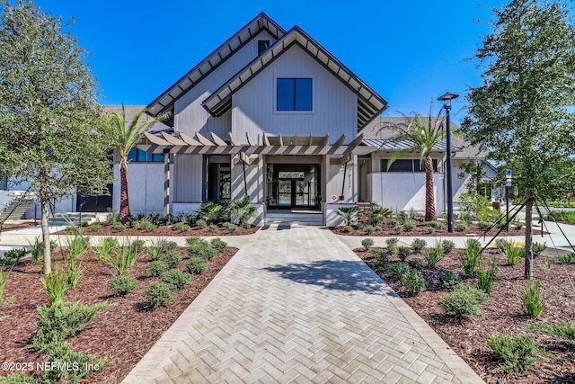 75586 Pondside Ln, Yulee, FL 32097 - modern inspired farmhouse featuring a pergola