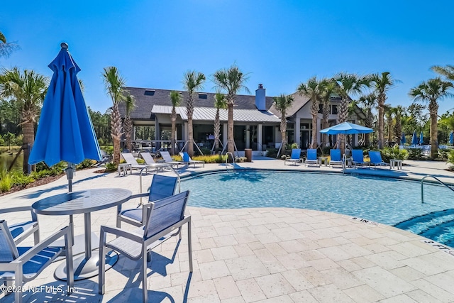 75586 Pondside Ln, Yulee, FL 32097 - pool featuring a patio area