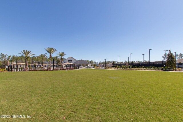 75586 Pondside Ln, Yulee, FL 32097 - view of home's community with a yard
