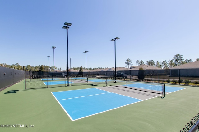 75586 Pondside Ln, Yulee, FL 32097 - view of tennis court featuring community basketball court and fence