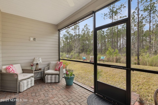 75586 Pondside Ln, Yulee, FL 32097 - sunroom with a ceiling fan and an outdoor living space