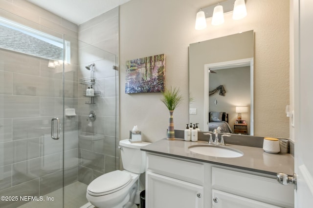 75586 Pondside Ln, Yulee, FL 32097 - bathroom with toilet, vanity, ensuite bathroom, and a shower stall