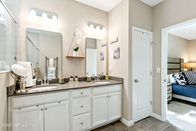 75586 Pondside Ln, Yulee, FL 32097 - ensuite bathroom featuring connected bathroom, double vanity, a stall shower, and a sink