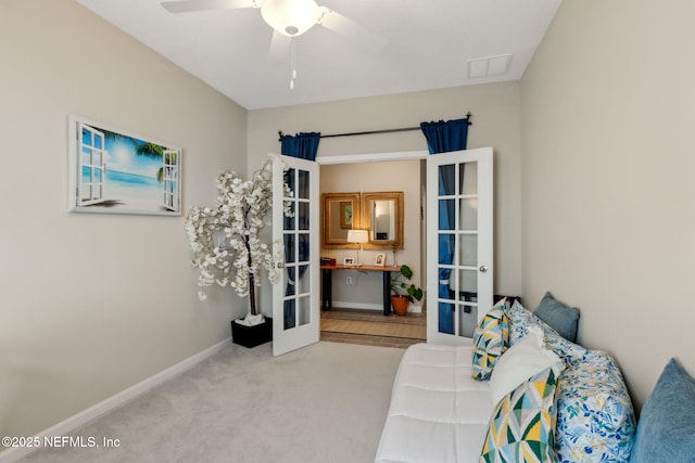 75586 Pondside Ln, Yulee, FL 32097 - carpeted bedroom featuring french doors, a ceiling fan, baseboards, and visible vents