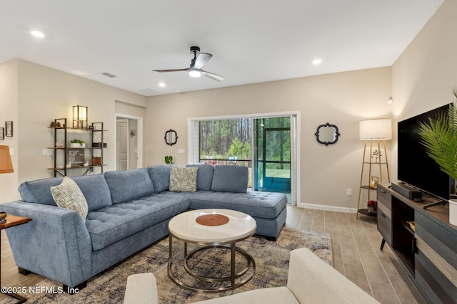 75586 Pondside Ln, Yulee, FL 32097 - living area featuring recessed lighting, wood finish floors, baseboards, visible vents, and ceiling fan