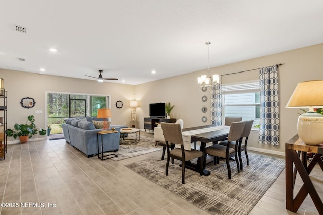 75586 Pondside Ln, Yulee, FL 32097 - dining space featuring baseboards, ceiling fan with notable chandelier, visible vents, light wood-style floors, and recessed lighting