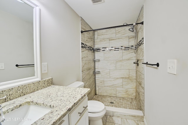 10568 Lake View Rd E, Jacksonville, FL 32225 - full bathroom with visible vents, marble finish floor, toilet, tiled shower, and vanity