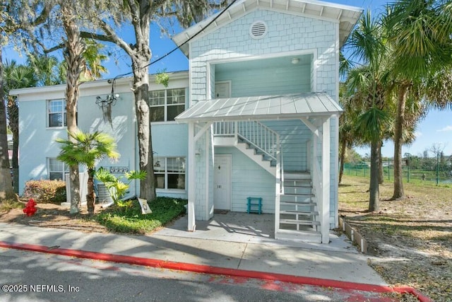 3434 Blanding Blvd Unit 201, Jacksonville, FL 32210 - view of front facade featuring stairs