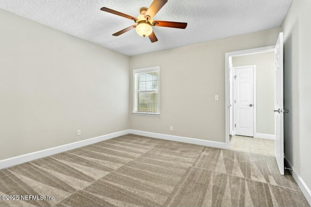 3434 Blanding Blvd Unit 201, Jacksonville, FL 32210 - carpeted empty room with a textured ceiling, baseboards, and ceiling fan