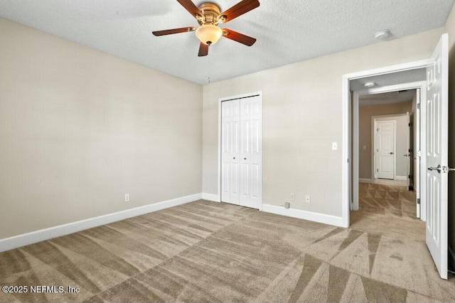 3434 Blanding Blvd Unit 201, Jacksonville, FL 32210 - unfurnished bedroom featuring carpet floors, a closet, and a textured ceiling