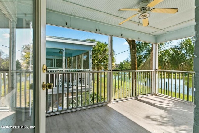 3434 Blanding Blvd Unit 201, Jacksonville, FL 32210 - unfurnished sunroom with a water view and ceiling fan