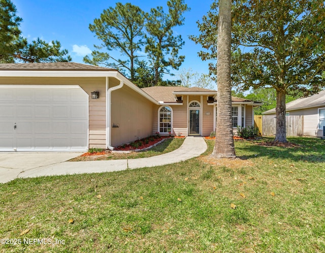 3387 Guernsey Ct, Jacksonville, FL 32226 - ranch-style home with an attached garage, fence, a front yard, and concrete driveway