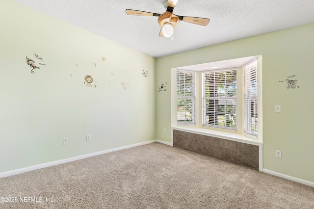 3387 Guernsey Ct, Jacksonville, FL 32226 - empty room featuring carpet floors, a ceiling fan, and a textured ceiling