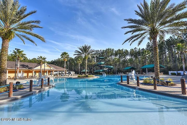 745 Austin Pl, Saint Johns, FL 32259 - community pool featuring a water slide and a patio
