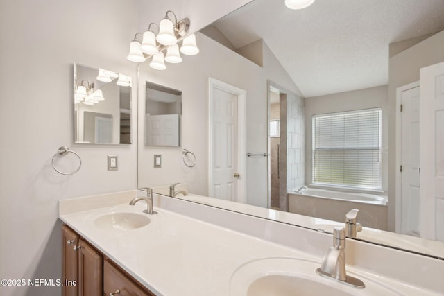745 Austin Pl, Saint Johns, FL 32259 - bathroom featuring double vanity, a chandelier, a bath, and vaulted ceiling