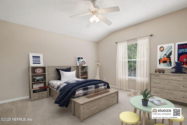 745 Austin Pl, Saint Johns, FL 32259 - carpeted bedroom featuring a textured ceiling, vaulted ceiling, baseboards, and ceiling fan