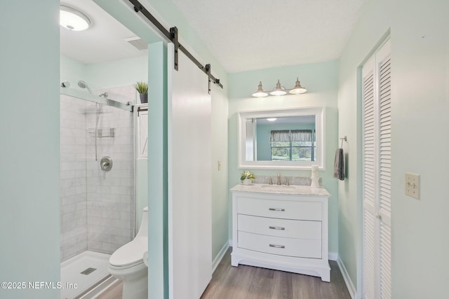 8314 Derbyshire Pl, Jacksonville, FL 32244 - bathroom with a stall shower, visible vents, a closet, and vanity