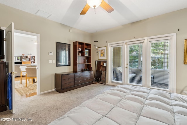 95062 Mackinas Cir, Fernandina Beach, FL 32034 - bedroom with baseboards, access to outside, a ceiling fan, and light carpet